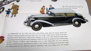 1934 Oldsmobile Six Dealer Color Sales Brochure Folder Original Coupe Sedan