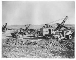 1920s Era Mack Dump Trucks at Work Factory Press Photo 0018 - Griffith Company
