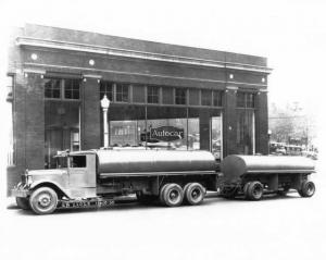 1930 Autocar Tanker Truck in Front of Dealership Press Photo 0044