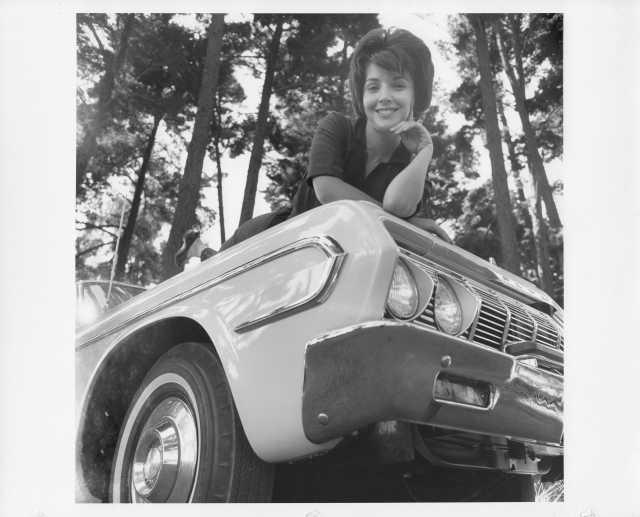1964 Plymouth Belvedere with Model on Hood Looking at You Press Photo 0099